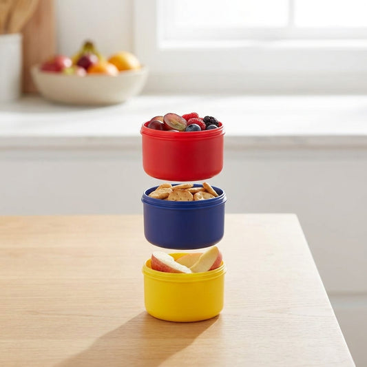 Stackable containers with snacks on a kitchen counter