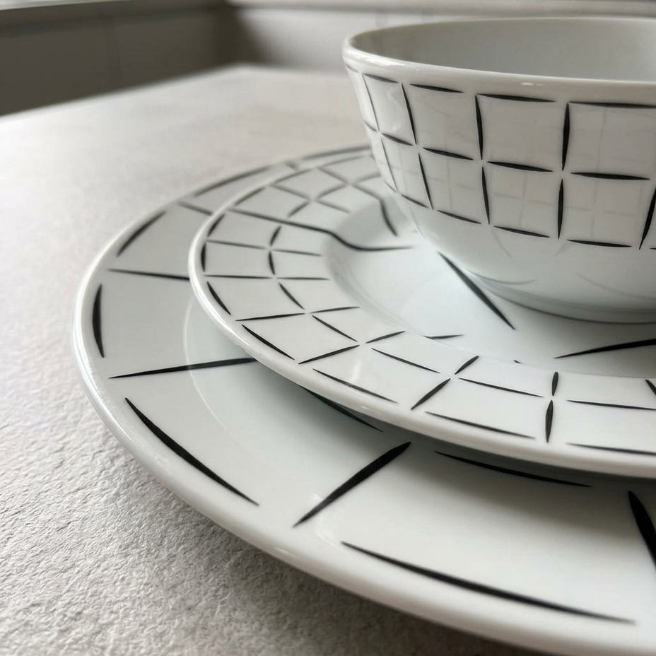 Ceramic dishes with geometric pattern on a kitchen counter