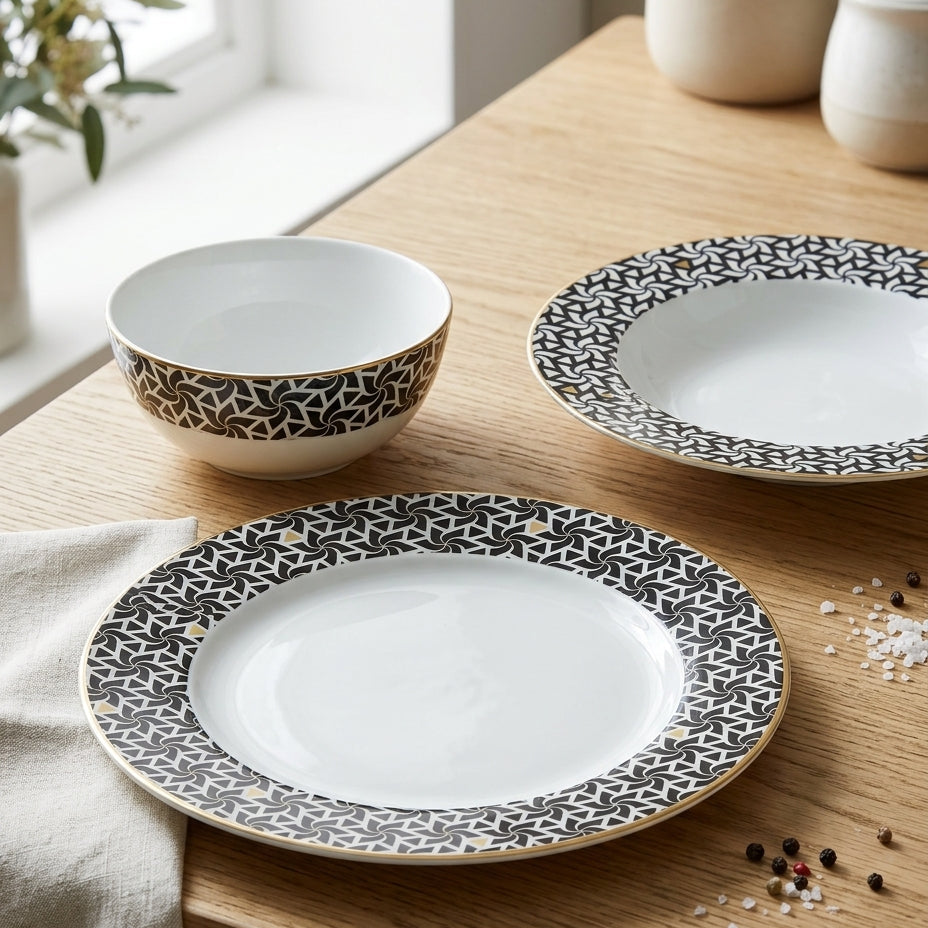 Dishes with black geometric patterns on a wooden table