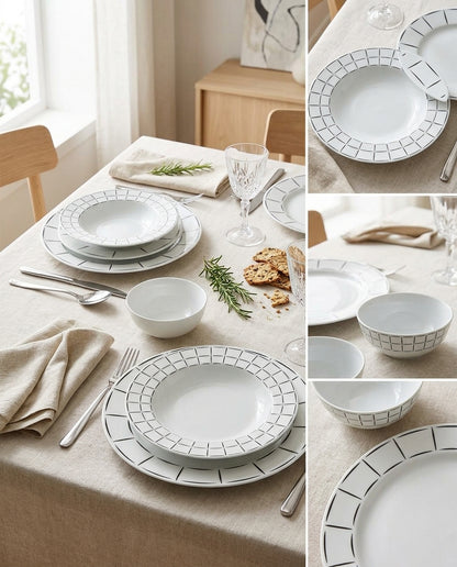 Set of white ceramic dinnerware with black geometric patterns on a dining table.