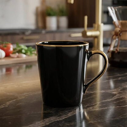 Black mug on a kitchen counter with blurred background