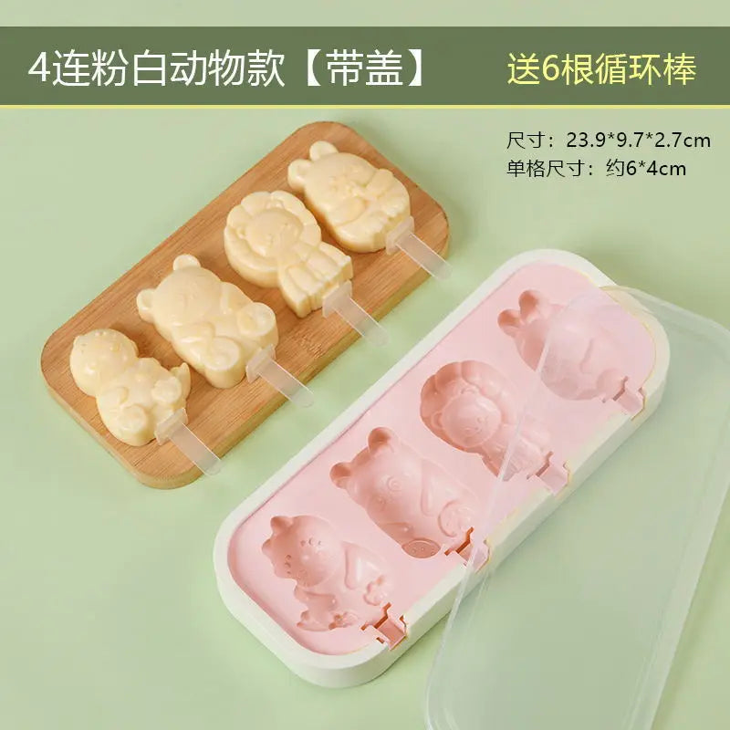 Silicone mold with animal-shaped cavities on a green background