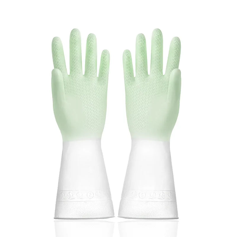 Pair of green and white gloves on a white background