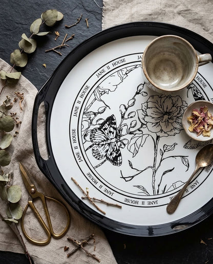 Black plastic tray – close-up of floral printed base