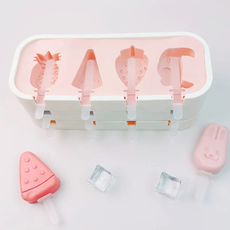 Popsicle mold with pink molds on a white background