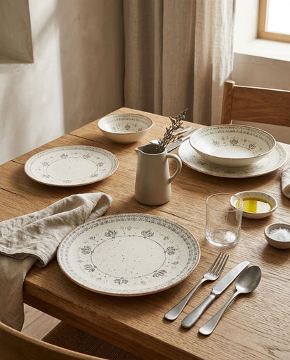 Botanical pattern and ivory finish on porcelain plates