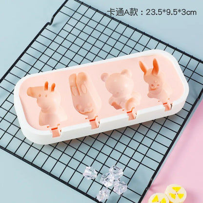 Ice cube tray with cartoon animal designs on a cooling rack