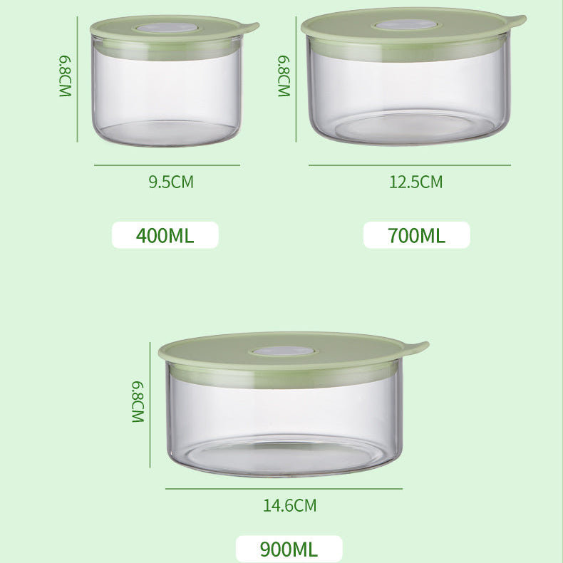 Three clear containers with green lids and measurements on a light green background