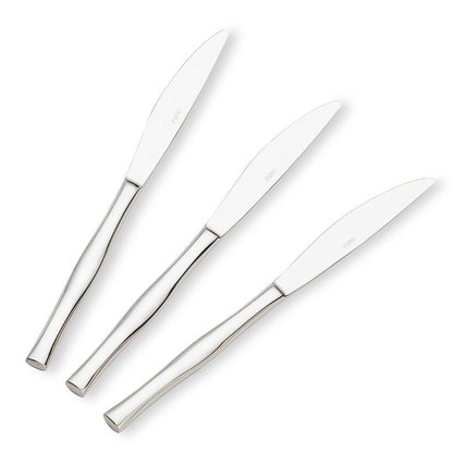 Three silver knives on a white background
