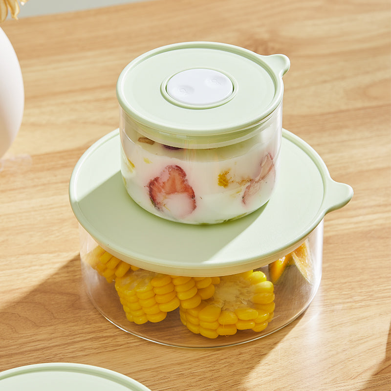 Container with a lid holding corn on a wooden surface