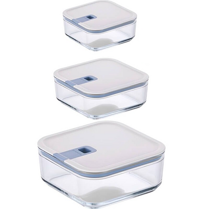  a square-shaped food storage container with a blue silicone lid, in a refrigerator filled with various other containers.